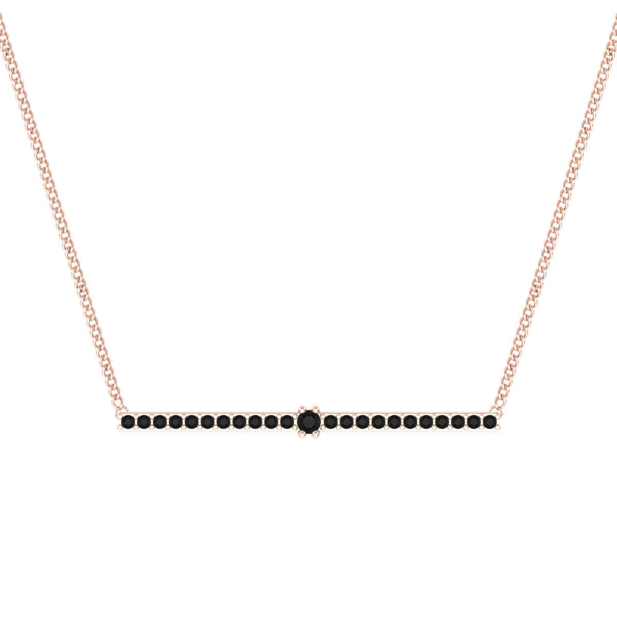 Line Pendant with sleek black stones on a delicate chain.