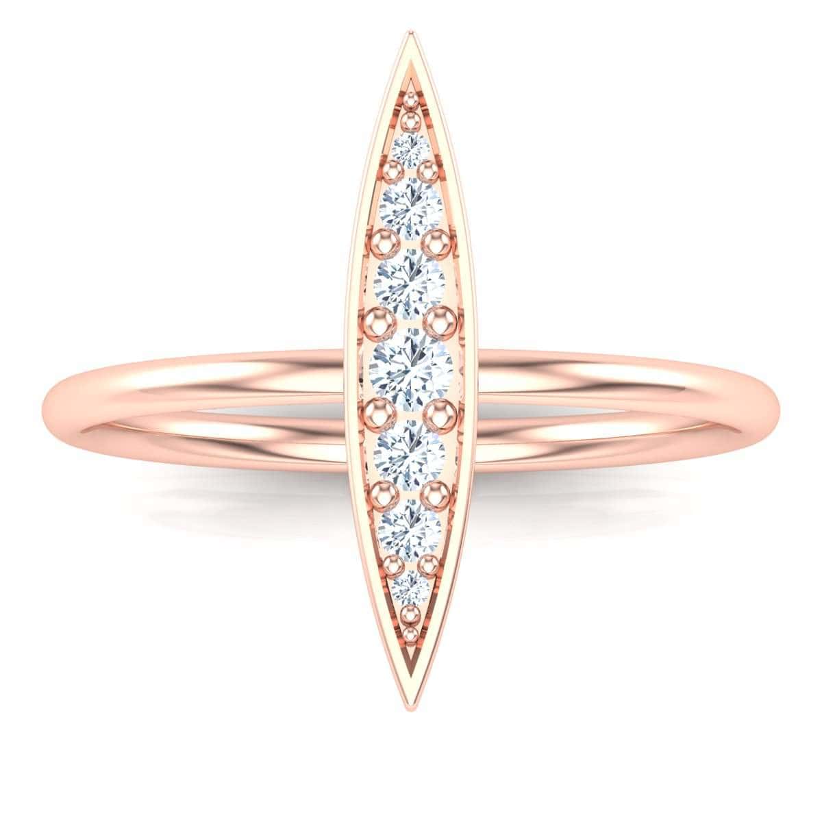 Elegant rice ring with diamond accents in rose gold.