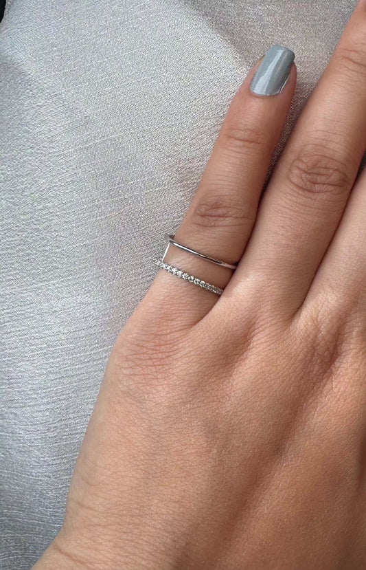 Curve Layer Ring on hand, showcasing elegant layered design.