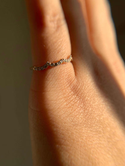 Three Peak Ring on finger, minimalist design with small peaks.