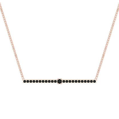 Line Pendant with sleek black stones on a delicate chain.