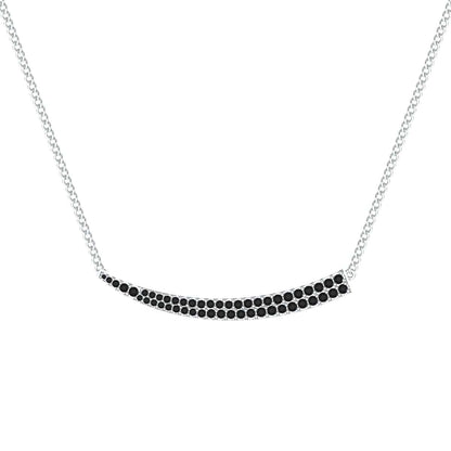 Tusk sward pendant necklace with black stones on a silver chain.