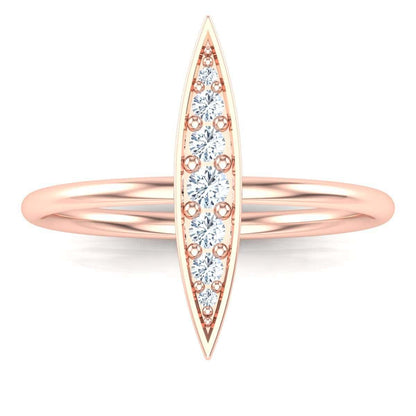 Elegant rice ring with diamond accents in rose gold.