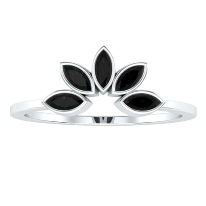 Elegant sunflower ring with black gemstone petals on a silver band.