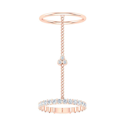 Elegant dual ring with connecting chain and diamond accents.